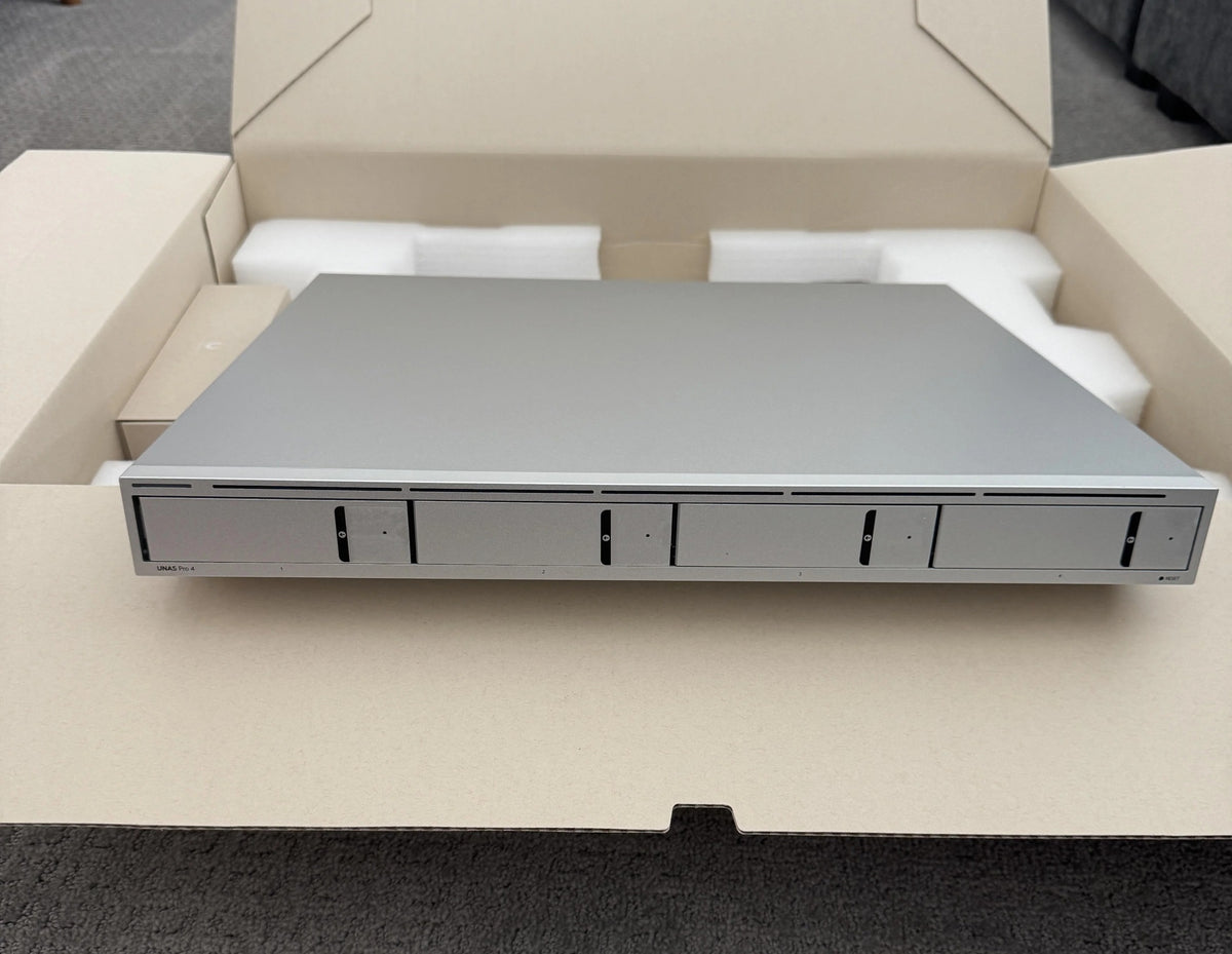 Ubiquiti UNAS-PRO-4 1U rack-mount NAS with (4) 2.5/3.5" HDD bays and (2) M.2 NVMe SSD cache slots, delivering faster access